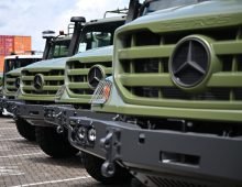 Newly manufactured Mercedes-Benz Zetros tactical trucks equipped for military defense operations stand parked outside a production hall at the Mercedes-Benz Trucks assembly plant in Woerth am Rhein, Germany. Photo: Katharina Kausche/dpa