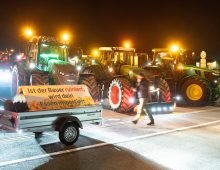 Tractors block the entrance to a Lidl logistics centre as farmers stage a nationwide protest against persistently low milk and butter prices, highlighting growing frustration within the agricultural sector. Photo: Sebastian Kahnert/dpa