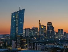 The lights of Frankfurt's banking towers glow in the gathering darkness, with the ECB (from left) dominating the skyline. Photo: Boris Roessler/dpa