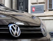 A Volkswagen car is parked in front of the Braunschweig Regional Court. Photo: Julian Stratenschulte/dpa Pool/dpa